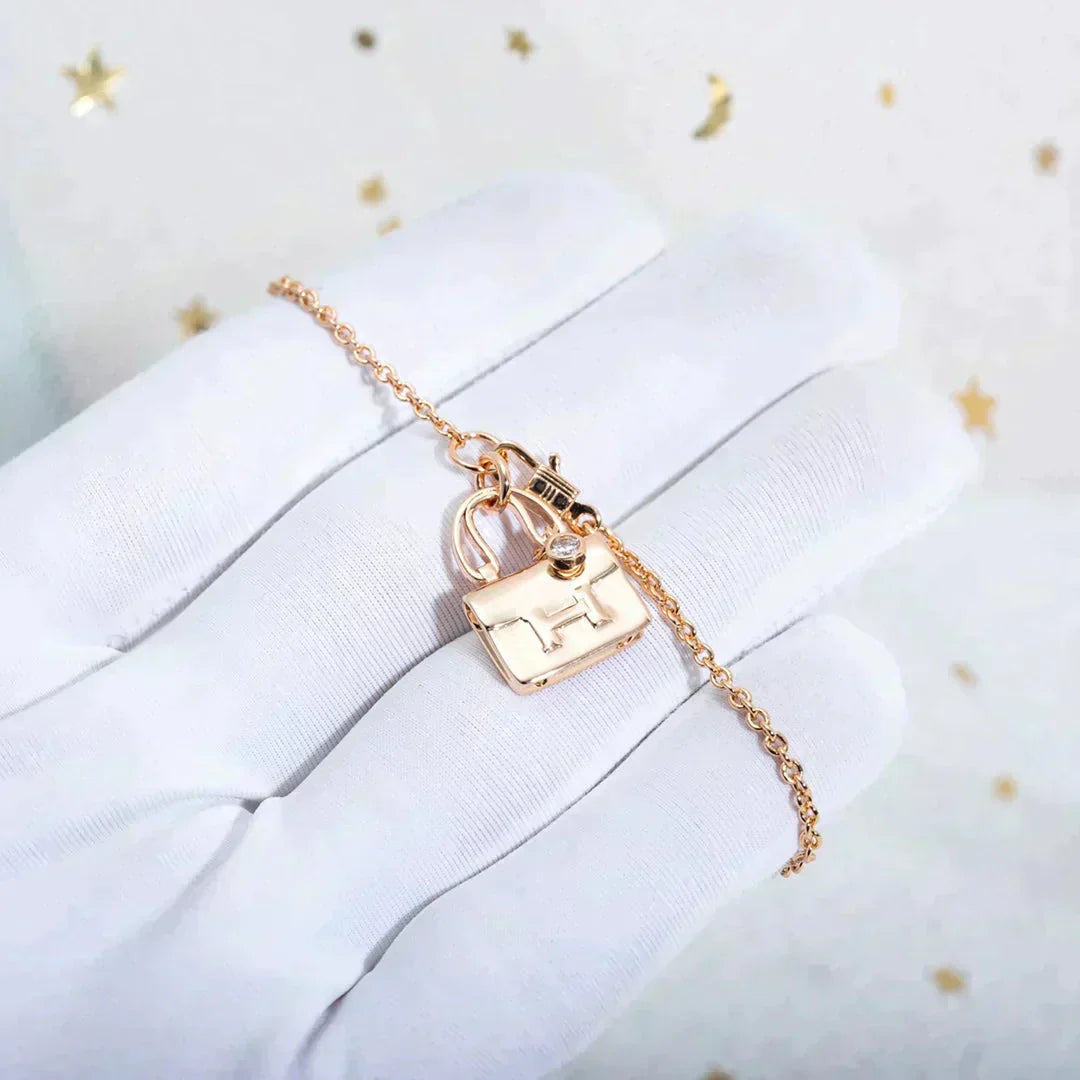 HERMES AMULETTE PEDANT ROSE GOLD NECKLACE