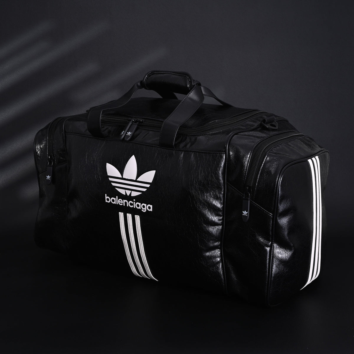 balenciaga-x-adidas-large-duffel-travel-bag-black-with-trefoil-logo-and-triple-stripes Handle