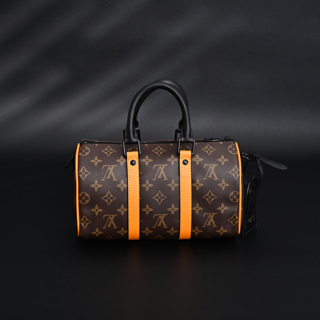 louis-vuitton-keepall-bandouliere-50-monogram-canvas-with-neon-orange-trim Handle