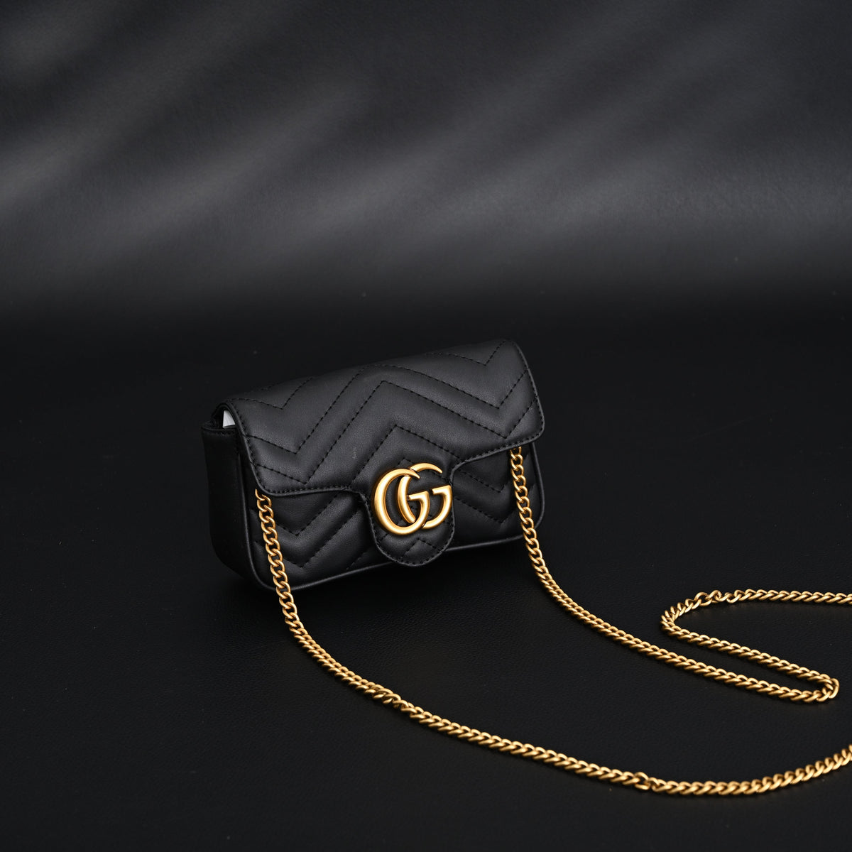 gucci-gg-marmont-matelasse-mini-shoulder-bag-black-leather-with-gold-chain Crossbody