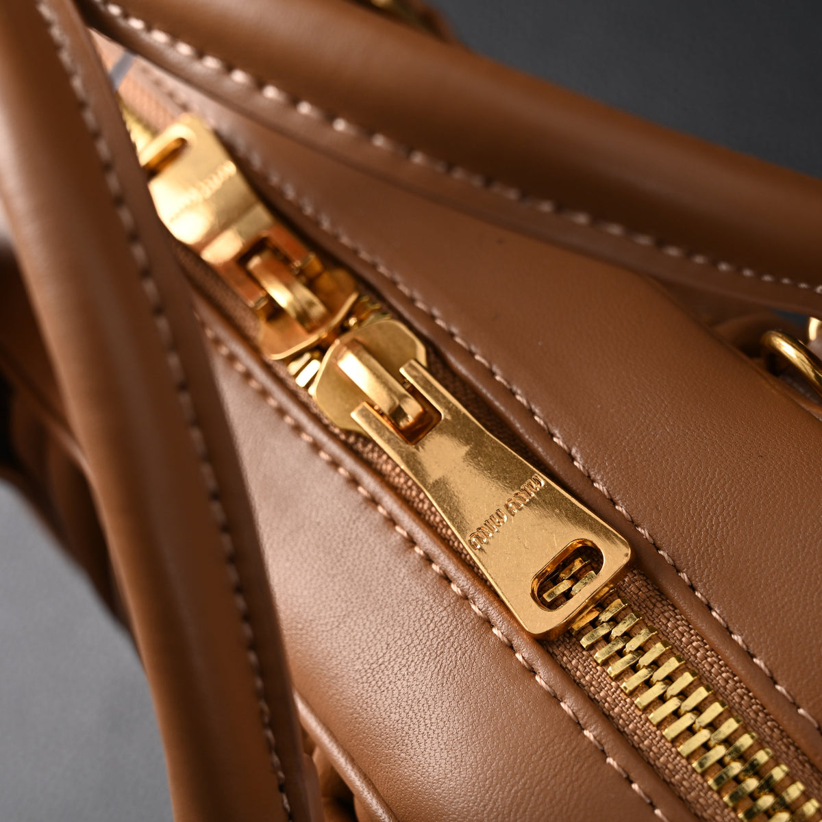 miu-miu-matelasse-leather-top-handle-bag-caramel-brown Handle