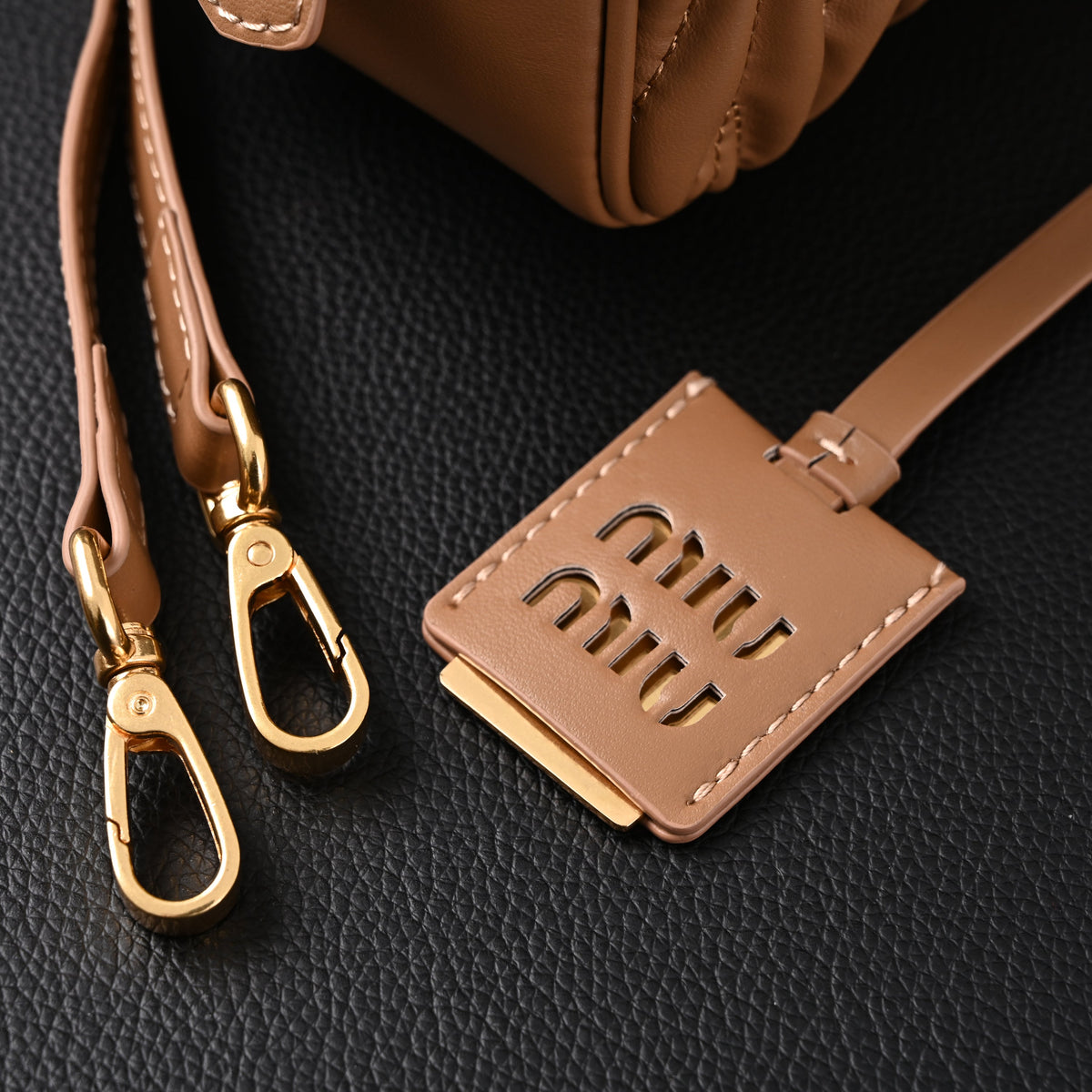 miu-miu-matelasse-leather-top-handle-bag-caramel-brown Handle