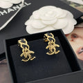 Chanel Black Leather Earrings