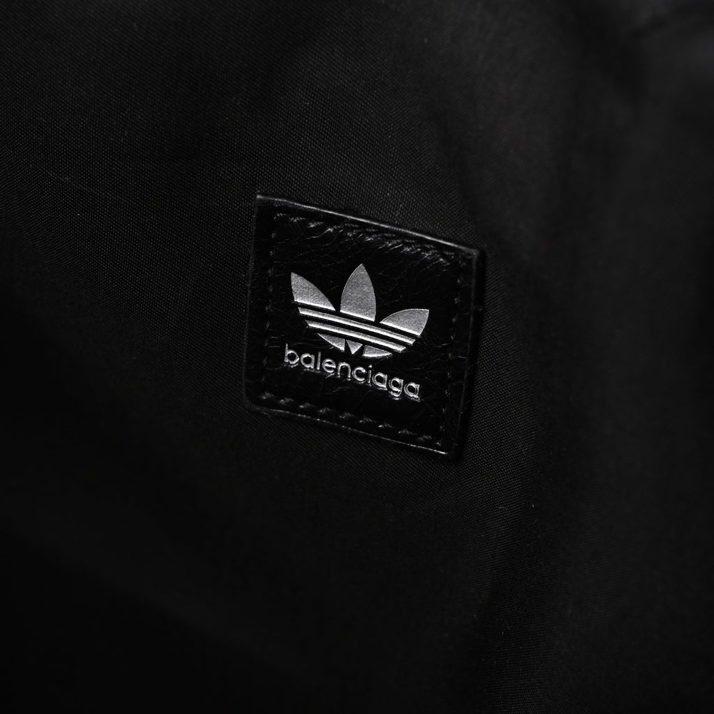 balenciaga-x-adidas-large-duffel-travel-bag-black-green-with-trefoil-logo-and-triple-stripes Handle